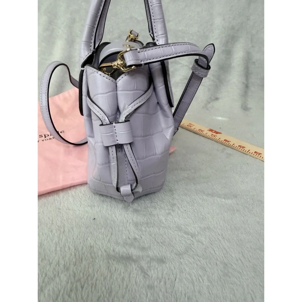 kate spade tags dust